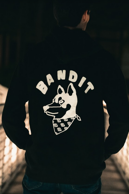 Bandit Logo hoodie black backside man standing on bridge